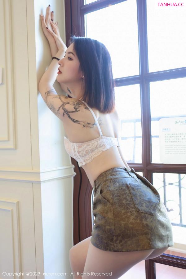   [XiuRen]高清写真图 2023.04.28 No.6661 乔一一 短裙美腿第49张图片